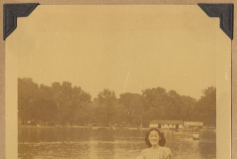 Grace poses by the water (ddr-densho-542-133)