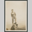 man on rock (ddr-densho-378-785)