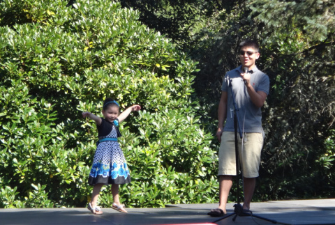 Brandon and Allie performing at Annual Meeting (ddr-densho-354-2711)