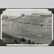 Football game in stadium with crowd in bleachers (ddr-ajah-2-511)