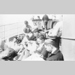 Men on ship's deck (ddr-densho-15-33)