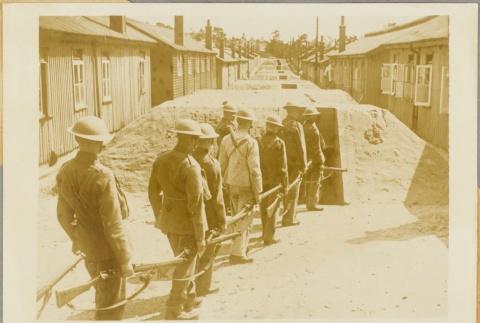 Home Guard servicemen outside an air raid shelter (ddr-njpa-13-282)