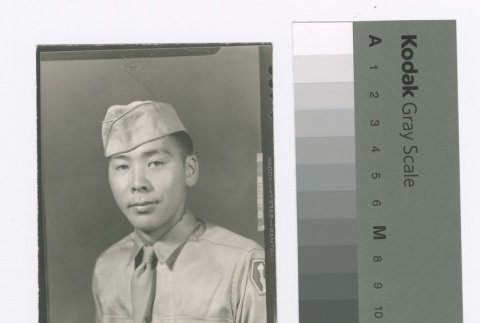 Japanese American man in military uniform (ddr-densho-255-120)