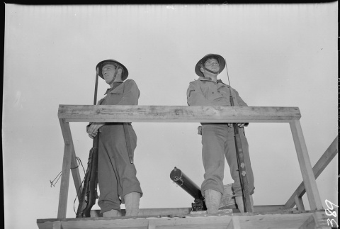 Military police on watchtower (ddr-densho-37-392)