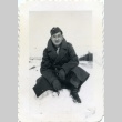 Soldier seated in the snow (ddr-densho-22-364)