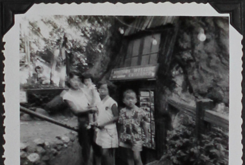 A family in a park on the Redwood Highway (ddr-densho-300-484)
