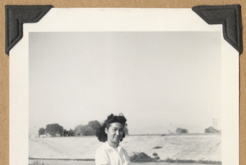 Girl with a bicycle (ddr-densho-542-236)