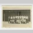 Nisei football players outside a barrack (ddr-csujad-44-19)