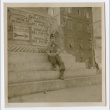 Soldier on steps in front of statue (ddr-densho-368-122)