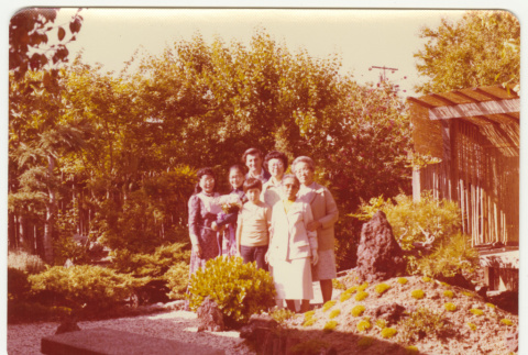 Group photograph in a garden (ddr-densho-433-574)