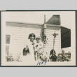 woman holding baby next a young child (ddr-densho-378-731)