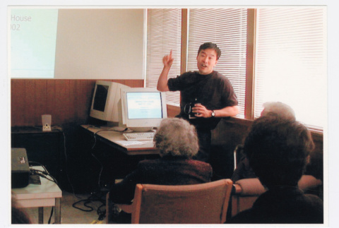 Tom Ikeda giving presentation at a Densho Open House 1 (ddr-densho-506-23)