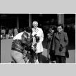 Harry Fukuhara, Loni Ding, one other, and cameraman (ddr-densho-1007-1179)