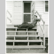 Man posing on stoop (ddr-densho-1007-604)