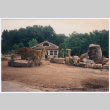 Pool house and excavators (ddr-densho-377-2653)