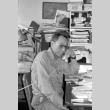 Man taking phone call (ddr-densho-1007-544)