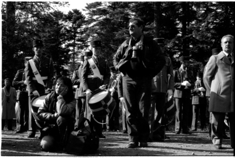 Kneeling woman, soldiers (ddr-densho-1007-1291)