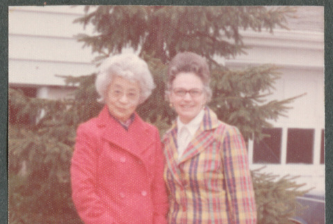 Agnes Sakura and another woman outside house (ddr-densho-523-659)
