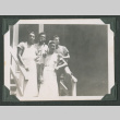 Five people standing by stairs (ddr-densho-471-97)
