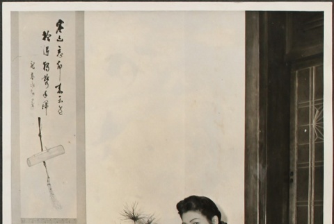 Woman in kimono with bonsai tree (ddr-densho-259-320)