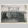 Standing mourners at Pvt. Minoru Ishida's memorial (ddr-densho-37-2009)