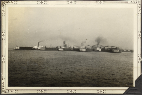 Row of ships (ferries?) (ddr-densho-326-555)