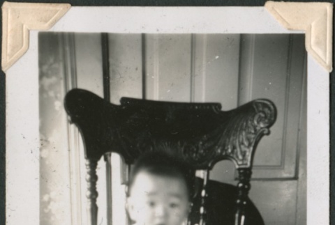 Baby sitting on a chair (ddr-densho-321-104)