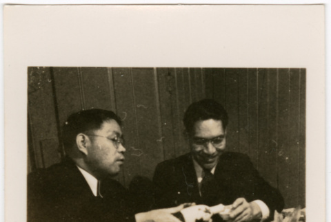 Two men pouring sake (ddr-densho-426-2118)