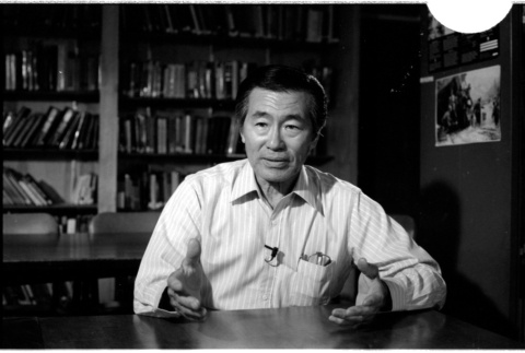Frank S. Emi at desk (ddr-densho-1007-1156)