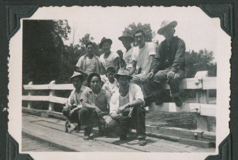 Nine men on bridge (ddr-densho-471-48)