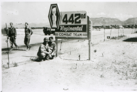 Soldiers with 442nd sign (ddr-densho-1007-754)