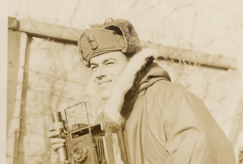 A U.S. Army combat photographer poses with his camera (ddr-njpa-2-183)