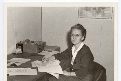 Woman at desk (ddr-hmwf-1-27)