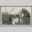 group photo near rock wall (ddr-densho-378-589)
