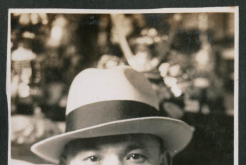 Photo of a man in a hat (ddr-densho-483-748)