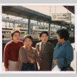 Sisters-in-law on train platform (ddr-densho-477-505)