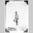William Kochiyama on rock (ddr-densho-1007-843)