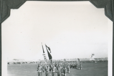 Men marching with flags (ddr-ajah-2-168)
