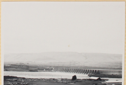 View of dam with roadway in foreground (ddr-densho-522-120)