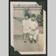 two kids sitting outside (ddr-densho-378-500)