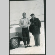 Two men standing in snow (ddr-densho-523-363)