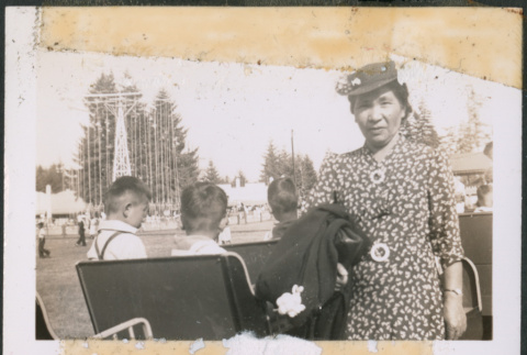 Woman with children at Playland (ddr-densho-483-1069)