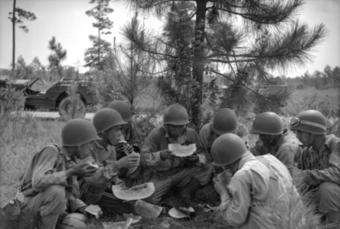 Soldiers eating watermelon (ddr-densho-1007-435)