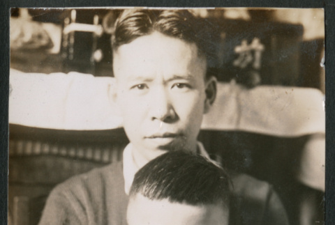 Photo of a man and child (ddr-densho-483-747)