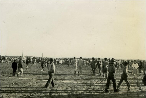 High school football game spectators (ddr-densho-159-247)