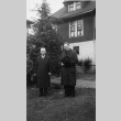 Priest and man in front of building (ddr-densho-330-259)
