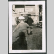 Photo of two children from behind (ddr-densho-483-850)