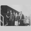 The Suzuki family posing in front of barracks at Minidoka concentration camp, Idaho (ddr-densho-243-3)