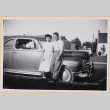 Couple standing next to car (ddr-densho-522-70)