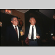 Two men laughing with drinks (ddr-densho-1007-740)